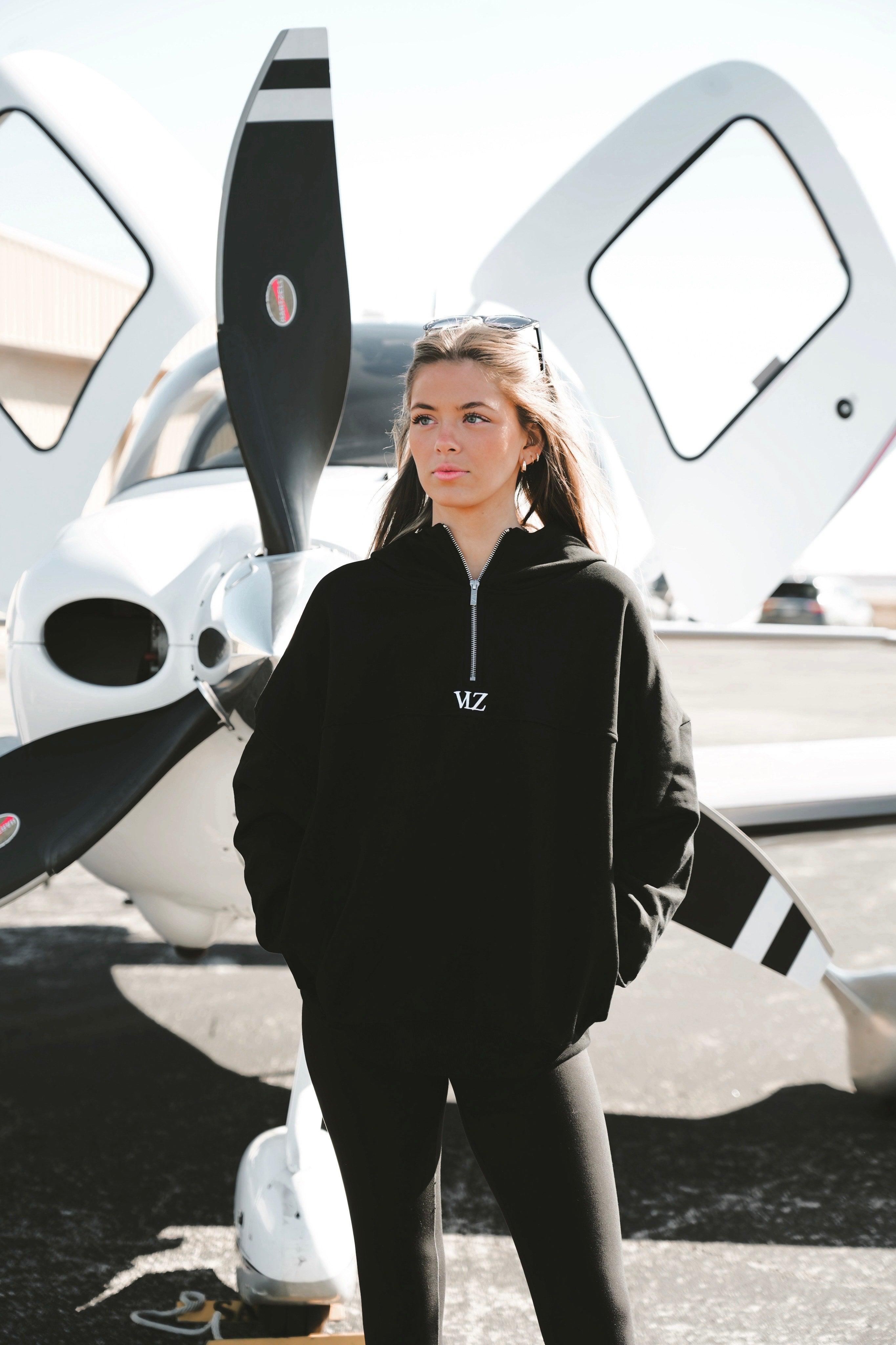 girl wearing black zip up