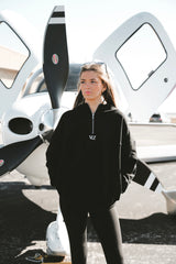 girl wearing black zip up